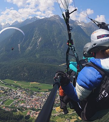 [Translate to English:] Tandemflug im Ötztal